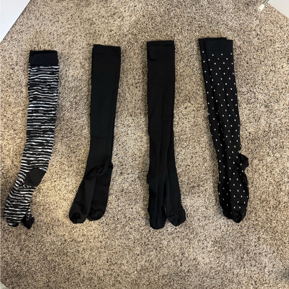 NWOT four pair of compression socks, size L/XL